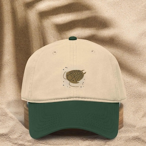 Trilobitpresenter: Broderad fossilhatt, förhistorisk basebollkeps, kambrisk bomullsleddjur