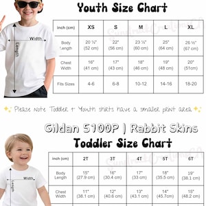 May include: A size chart for Gildan 5000B youth and Gildan 5100P Rabbit Skins toddler t-shirts. The chart displays body length, chest width, and sleeve length measurements in inches and centimetres for sizes XS-XL and 2T-6T respectively.