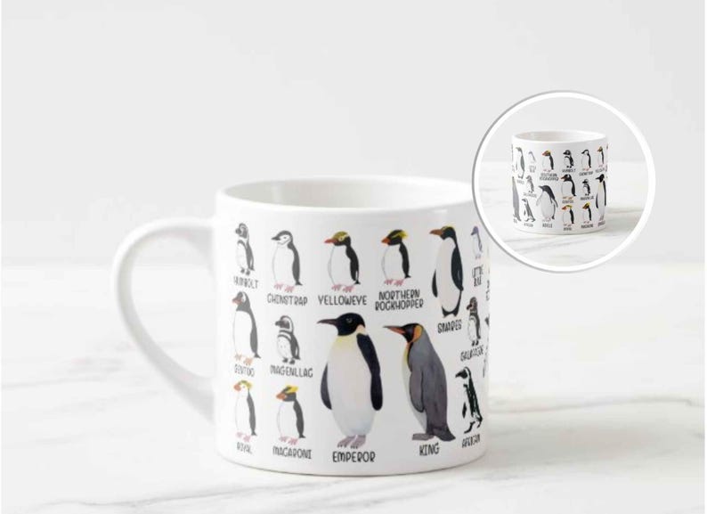 May include: White ceramic mug featuring illustrations of various penguin species, each labeled with its name. The mug includes a handle and a smaller inset image of the mug. The penguin illustrations are in black, white, and yellow.