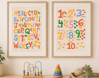 May include: Two framed educational prints. One features the alphabet in various colors, the other displays numbers one through ten with corresponding illustrations. The prints are in wooden frames, suitable for a child's room.