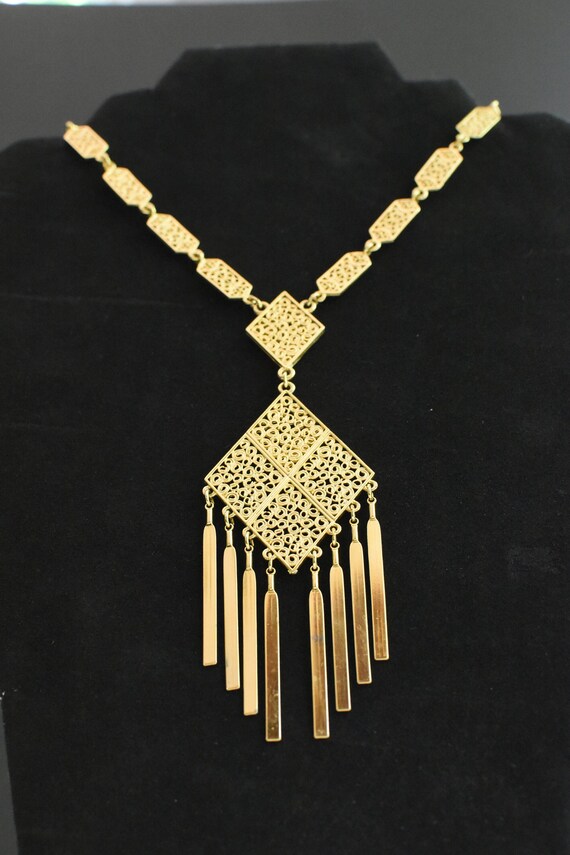 Unsigned 1960s-70s Dramatic Fringe Gold Tone Intri