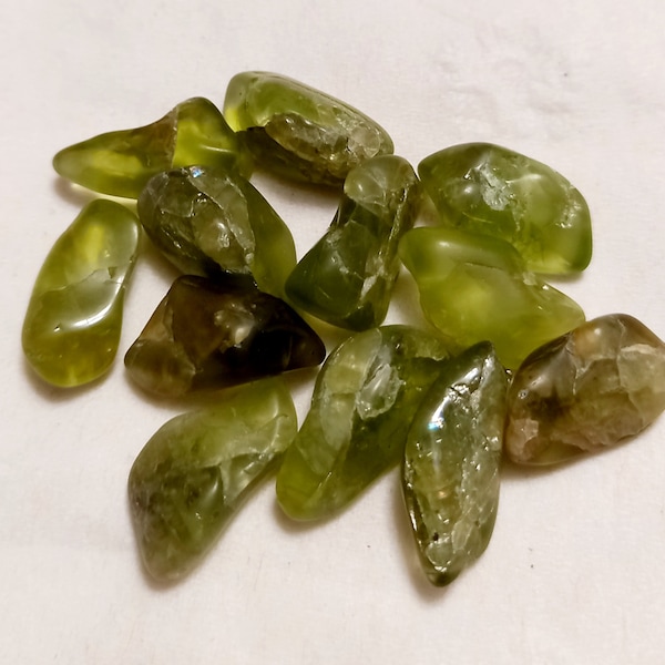 Beautiful Peridot tumbled stone - 12 pieces