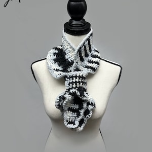 Sophisticated black-and-white crochet keyhole scarf, handmade from acrylic yarn
