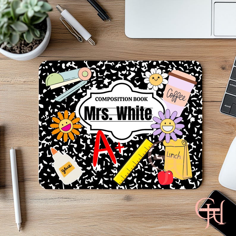 May include: A black and white composition book design mousepad with school-themed graphics. Features a white label with "Mrs. White" and "Composition Book" text. Includes a stapler, glue, flowers, coffee cup, ruler, apple, and lunch bag.