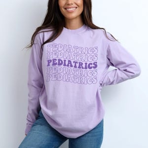 Pediatric Nurse Sweatshirt - Women's Long Sleeve Graphic Pullover, Gift For Nurses & Nursing Students - View #12