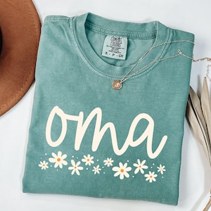 Camiseta de abuela con colores cómodos, camiseta de abuela con flores silvestres, regalo para abuela, regalo para abuela primeriza, anuncio de embarazo, abuela alemana, camiseta para abuela Light Green