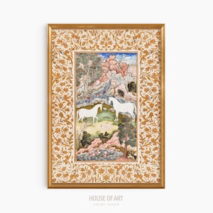 May include: A framed art print featuring a detailed landscape scene with two white horses in a meadow. The artwork has a gold frame with an ornate floral pattern. The print depicts a serene scene with trees, mountains, and figures.