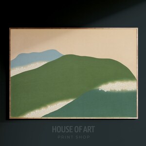 May include: Abstract art print featuring a landscape of green, blue, and beige hills with white accents. The print is framed in a light wood frame.