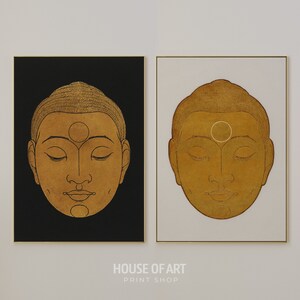 May include: Two framed prints of gold-toned illustrations of a person's face with eyes closed. The face is outlined in black and has a circle on the forehead. The background of one print is black and the other is white.