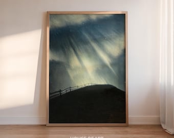 May include: A framed landscape print featuring a dark hill with a wooden fence, under a dramatic sky with streaks of light. The artwork is in a wooden frame and is displayed on a wooden floor. The print has the text "HOUSE OF ART PRINT SHOP" at the bottom.