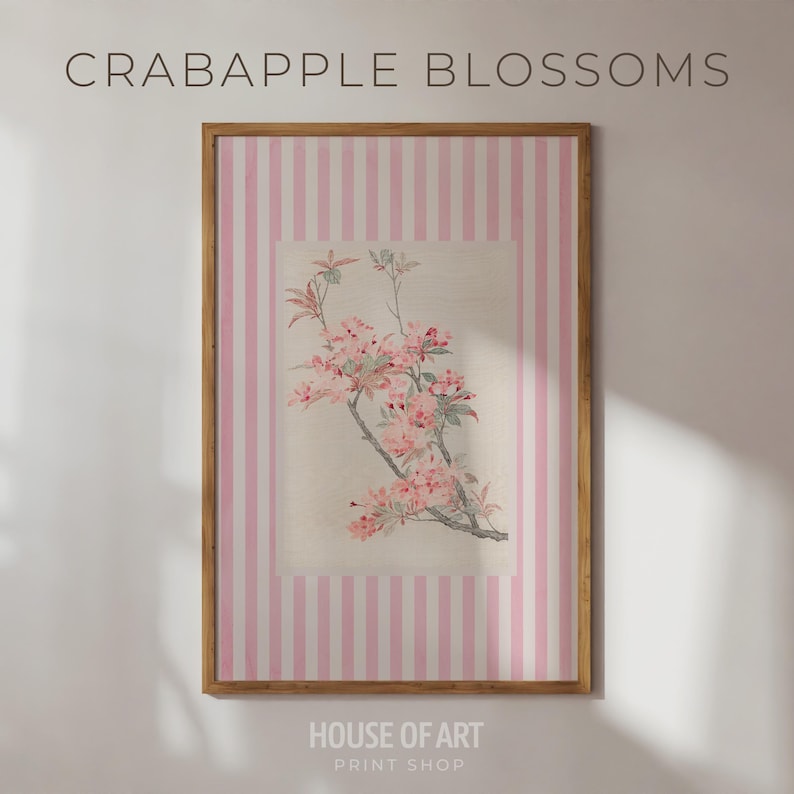 May include: A framed print featuring a floral illustration of crabapple blossoms. The artwork is set against a background of pink and white vertical stripes, with the text "CRABAPPLE BLOSSOMS" at the top and "HOUSE OF ART PRINT SHOP" at the bottom.