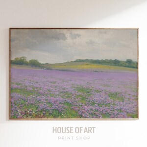 May include: A painting of a field of purple wildflowers with a rolling green hill in the background. The sky is cloudy and gray.
