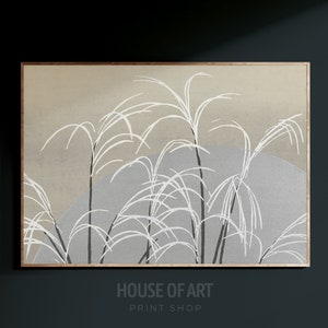 May include: A framed print of a minimalist abstract art design featuring white brushstrokes on a beige and gray background. The artwork depicts a stylized representation of tall grass or reeds.