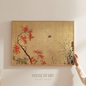 May include: A framed art print with a gold background, showcasing a Japanese-style landscape. It features a tree with red leaves, tall grasses, and a bird in flight. The text "HOUSE OF ART PRINT SHOP" is visible at the bottom of the print.