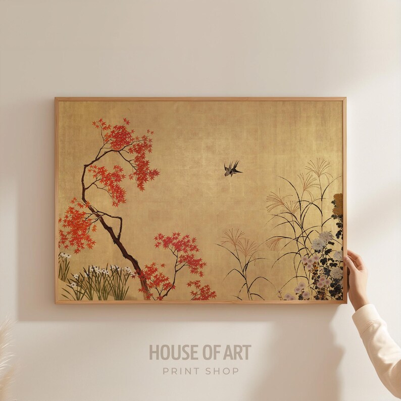 May include: A framed art print with a gold background, showcasing a Japanese-style landscape. It features a tree with red leaves, tall grasses, and a bird in flight. The text "HOUSE OF ART PRINT SHOP" is visible at the bottom of the print.