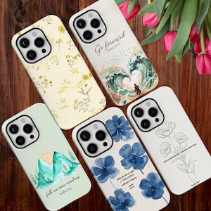 May include: A collection of phone cases with various designs. One case features a mountain scene with the text "faith can move mountains." Another has blue floral art and the text "When the time is right, the Lord will make it happen." Other cases have floral and wave designs.