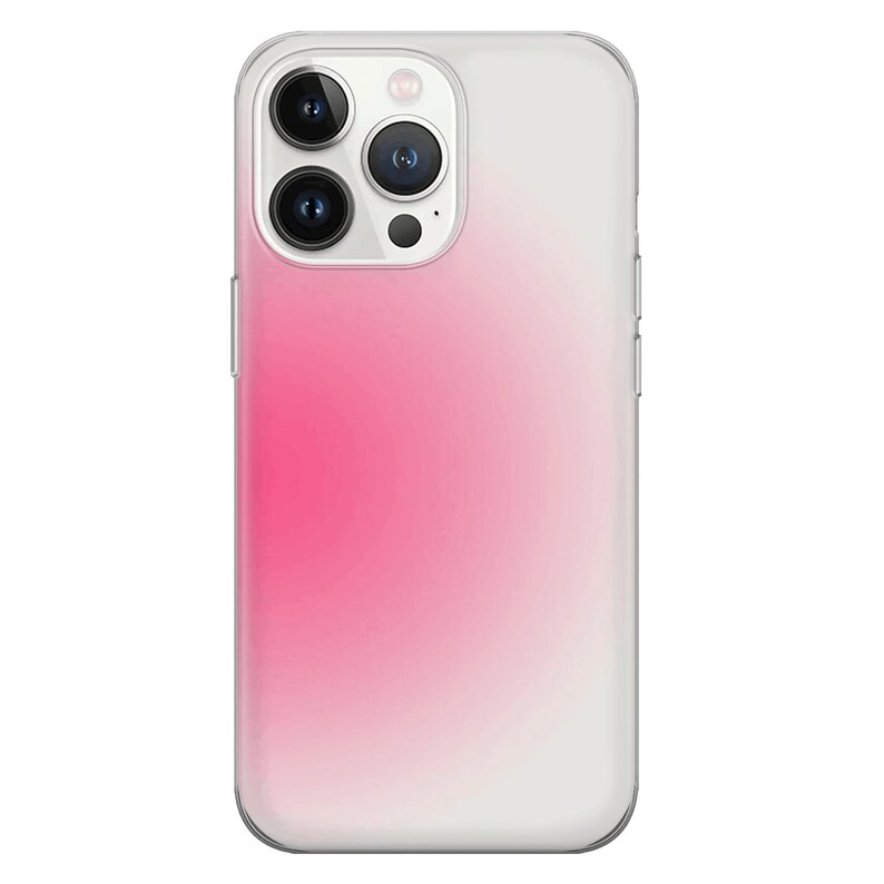 May include: A clear phone case with a pink to white gradient design. The case has a raised camera bump with three black camera lenses.