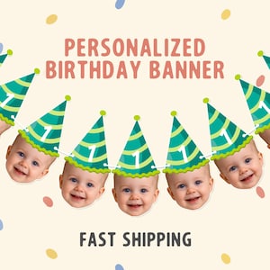 May include: A personalised birthday banner showing smiling baby faces wearing green and white party hats with the number one. The banner has the text "PERSONALIZED BIRTHDAY BANNER" in pink and "FAST SHIPPING" in black.