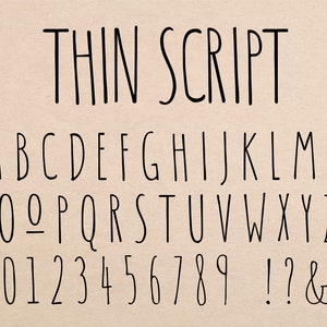 May include: A black and white alphabet font with the words "THIN SCRIPT" at the top. The font is a simple, handwritten style.