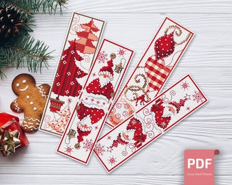 May include: Four red and white Christmas-themed cross stitch bookmark patterns. The patterns feature a Christmas tree, Santa Claus, a candy cane, and a snowflake.
