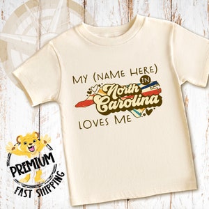 our cute north carolina onesie is perfect for that loved one who lives out of state. Great for cousins, grandmas or as a family onesie.
