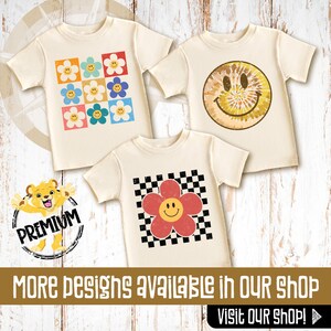 our happy face daisy toddler shirt and onesie is perfect for your loved one or as a gift.
