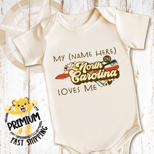 our cute north carolina onesie is perfect for that loved one who lives out of state. Great for cousins, grandmas or as a family onesie.