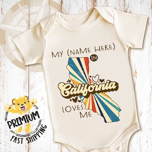 Personalized California Retro Onesie® - Someone In CA Loves Me Shirt - Cute Custom State Family Present - Adorable New Parent Gift - 0873