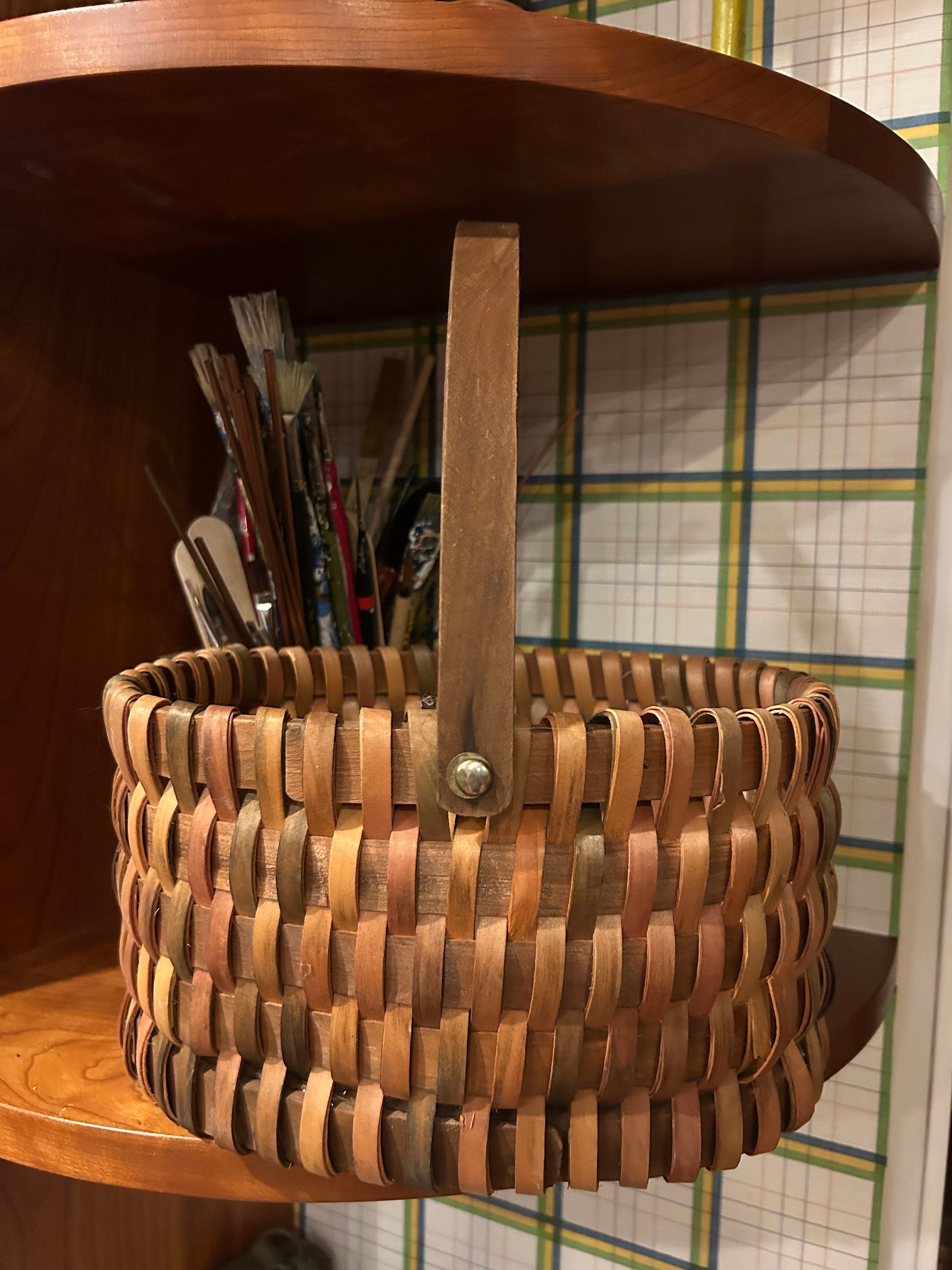 ヴィンテージの楕円形の籐編みバスケット（ハンドル付き）不動産物件