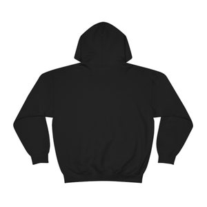 May include: A black hooded sweatshirt with a pouch pocket. The sweatshirt has long sleeves and a drawstring hood.