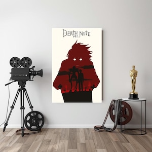 May include: A canvas print featuring a red silhouette of a character with the text "Death Note" in black. The artwork depicts a scene with figures and trees in a red and black color scheme. The print is displayed on a white wall.