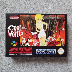 May include: A Super Nintendo Entertainment System game cartridge box for Cool World, a platformer video game. The box features a colourful illustration of the game's characters, including a woman in a white dress, a rabbit, and a bird. The box is black with a blue and white Ocean Software logo and the text "Licensed by Nintendo" and "PAL Version".