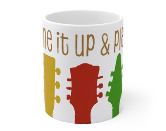 Guitar silhouette mug. 11 oz. Frieze of 5 colorful guitar headstocks with message, Tune it up & play! Gift for guitarist.