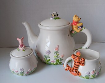 Disney Simply Pooh Tea Pot, Sugar Bowl & Creamer Set.  Floral winnie Tigger And Piglet