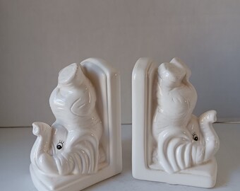 Coppia vintage di fermalibri con animali in ceramica a forma di elefante bianco