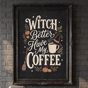 Op de afbeelding: Een ingelijste kunstprint met een zwarte achtergrond en de tekst Witch Better Have My Coffee in witte en oranje letters. Het ontwerp bevat illustraties van een heksenhoed, een koffiemok, een bezem en kleine pompoenen met bladeren.
