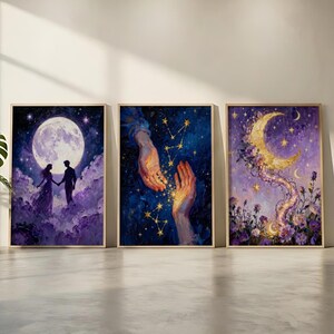 May include: Three framed art prints with a celestial theme. One depicts a couple in silhouette under a full moon. Another shows hands reaching for golden stars against a blue background. The third features a golden crescent moon with floral accents.
