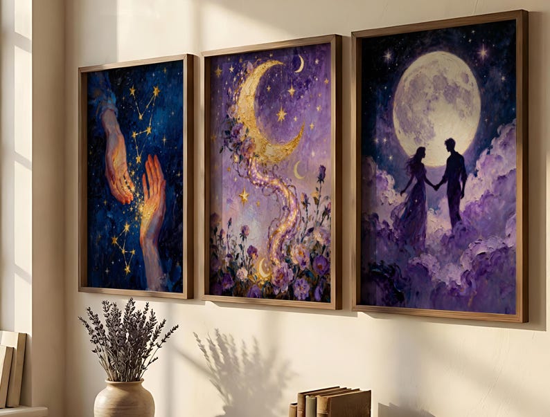 May include: Set of three framed art prints. The artwork features celestial and romantic themes, including hands reaching for stars, a crescent moon with floral accents, and a couple holding hands under a full moon. The color palette includes blues, purples, and gold.