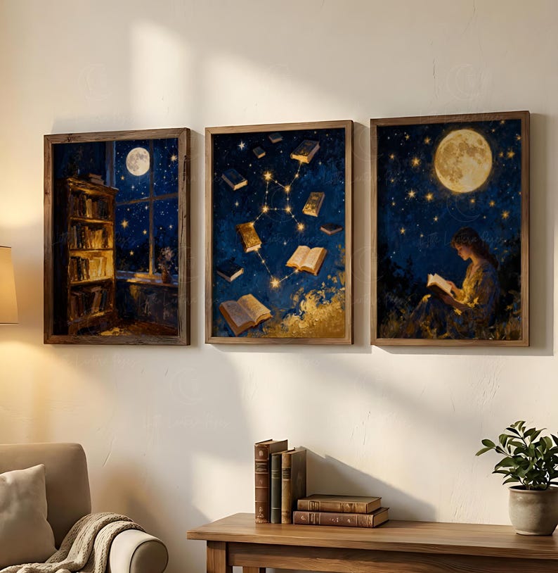 May include: Three framed art prints with a night-time theme. One shows a bookshelf by a window with a full moon. Another features books floating in a starry sky. The third depicts a person reading under a full moon, with a dark blue and gold colour scheme.