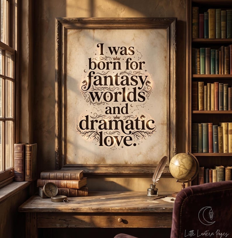 May include: A framed wall art print on aged parchment paper featuring the dark brown text I was born for fantasy worlds and dramatic love, decorated with small crowns, stars, constellations, and dragon silhouettes in a dark wooden frame.