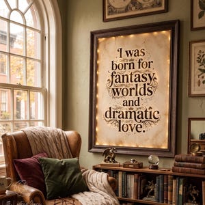 May include: A rectangular wall-mounted sign with a dark brown frame and internal warm lighting. The off-white center features the black text: I was born for fantasy worlds and dramatic love, surrounded by small decorative flourishes and stars.