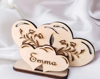 Personalized wooden heart-shaped wedding place cards