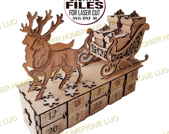 May include: A laser-cut wooden advent calendar featuring a reindeer pulling a sleigh filled with gift boxes. The base contains numbered drawers from 5 to 22, decorated with snowflake cutouts. Text on the top reads: DIGITAL FILES FOR LASER CUT SVG DXF AI.