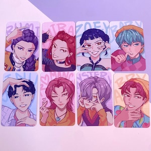May include: Set of eight rectangular art prints featuring stylized illustrations of people with various hairstyles and expressions. Each print has a pastel background with text. The illustrations are in a cartoon style with bright colors.