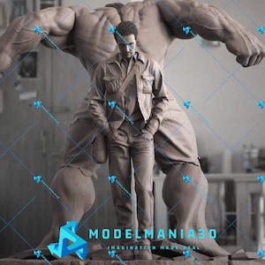 May include: A gray clay sculpture of a man standing in front of a larger gray clay sculpture of a muscular figure. The smaller sculpture is wearing a jacket and jeans. The larger sculpture has its arms raised and its fists clenched. The text "MODELMANIA3D IMAGINATION MADE REAL" is visible at the bottom of the image.