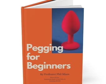 May include: An orange book titled "Pegging for Beginners" with a red sex toy on the cover. The book's cover also includes the author's name and credentials. The book is open, revealing white pages.