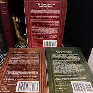 May include: Three paperback books with green, red, and brown covers. The books are titled "The Revolution is Consciousness", "An Alternative Narrative", and "All That is Hidden Will Be Revealed". Each book has a description on the back cover.