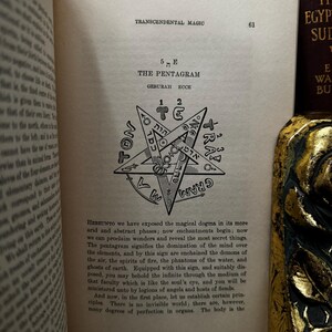 May include: A black and white illustration of a pentagram with Hebrew letters and the words "GEBURAH ECCE" and "THE PENTAGRAM" printed above it. The image is from a book on transcendental magic.