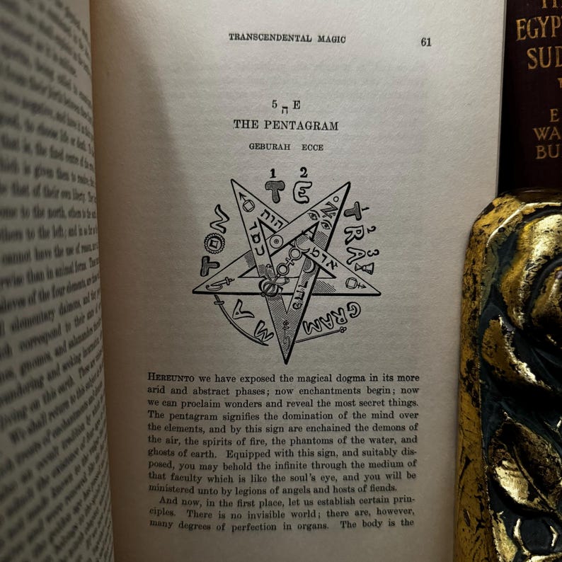 May include: A black and white illustration of a pentagram with Hebrew letters and the words "GEBURAH ECCE" and "THE PENTAGRAM" printed above it. The image is from a book on transcendental magic.