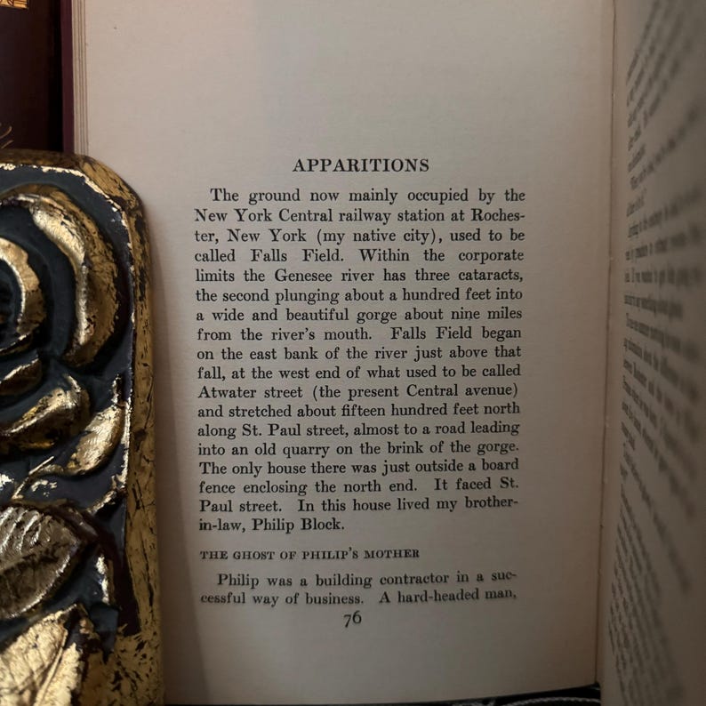 May include: A page from a book titled "Apparitions" with text about the history of a place called Falls Field, New York. The text describes the area as being near a river with a gorge and a quarry. The text also mentions a building contractor named Philip.